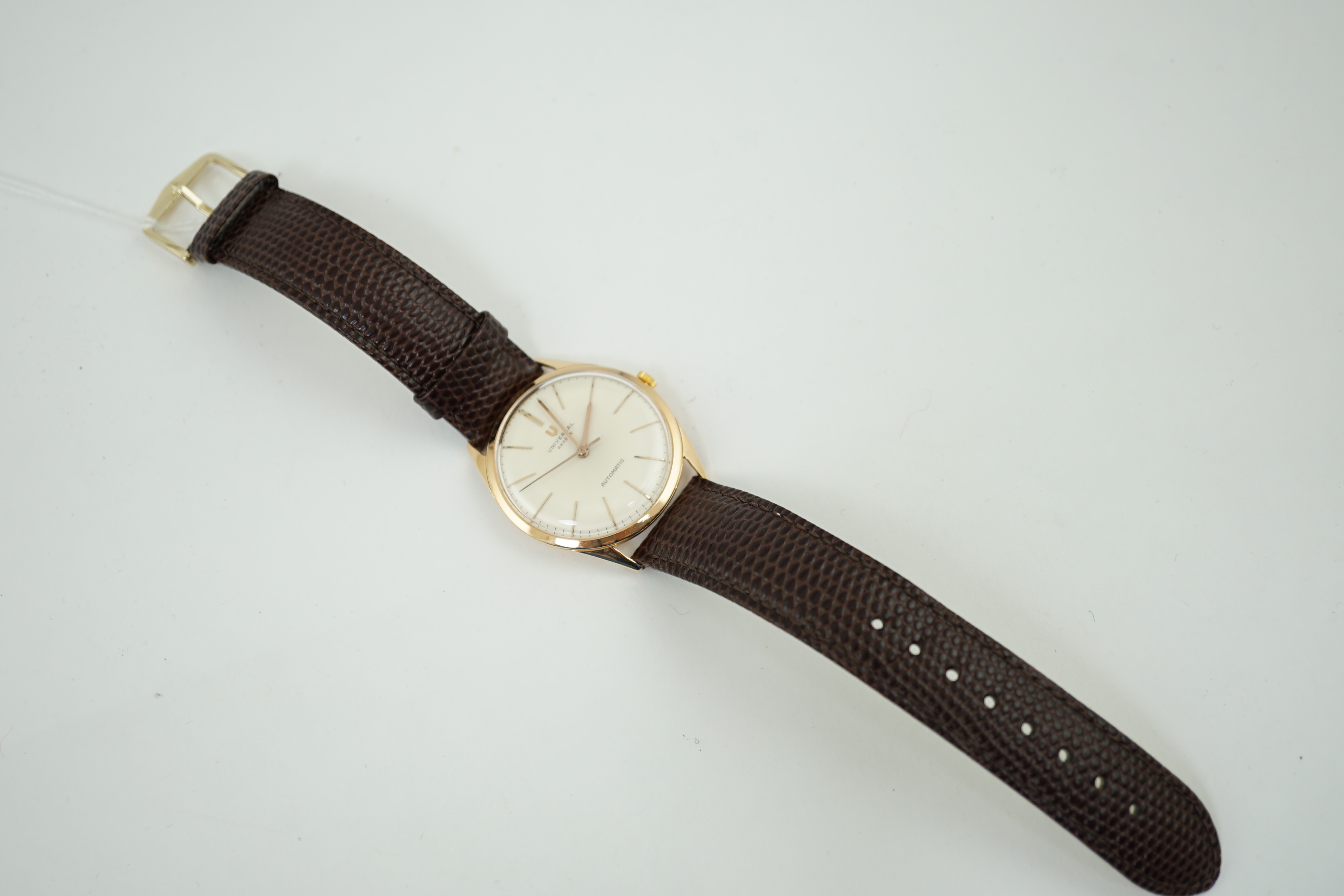 A gentleman's 1950's 18k pink gold Universal automatic wrist watch